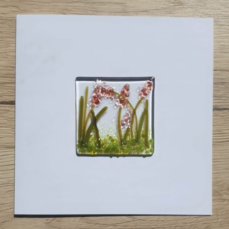 Keepsake fused glass blank card featuring coral pink flower spikes