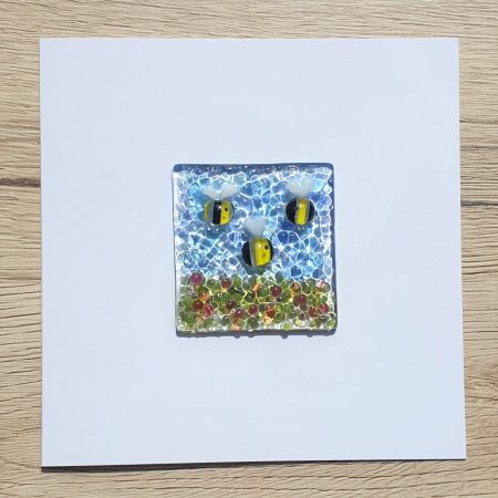 Keepsake fused glass blank card featuring a trio of bees in a meadow of flowers