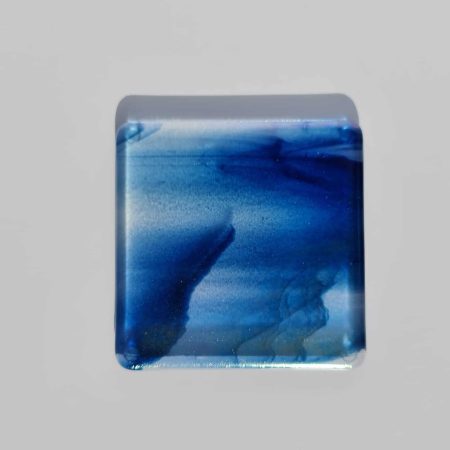 Fused glass streaky blue colour coaster with iridised rainbow finish