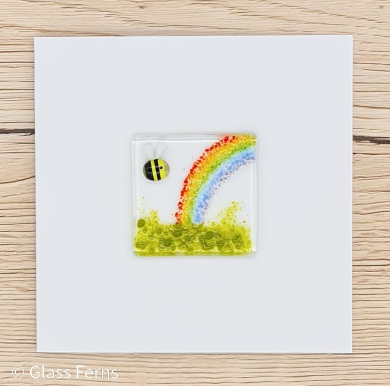 Keepsake fused glass blank card featuring a buzzing bee with a rainbow