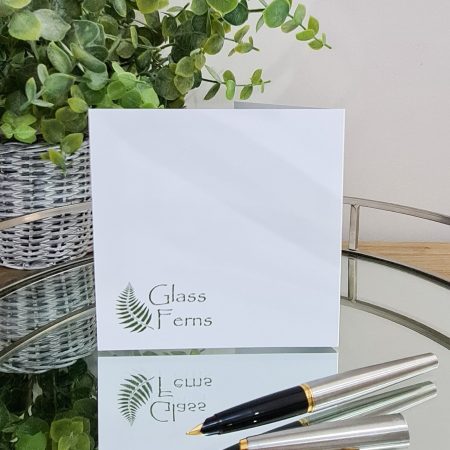 Keepsake fused glass blank card featuring a little bee buzzing in amongst bright red poppies