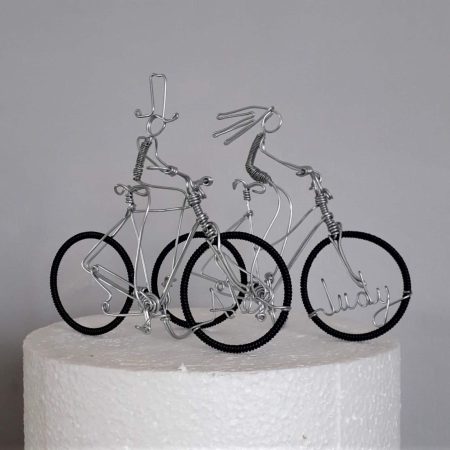 Mr and Mrs Bicycle wedding cake toppers.