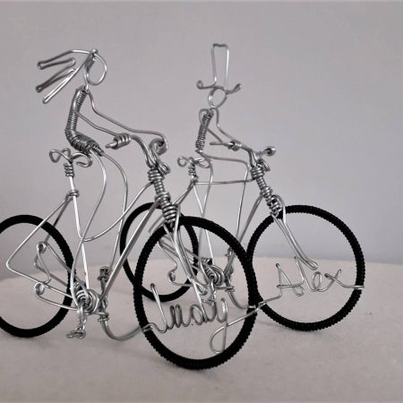 Mr and Mrs Bicycle wedding cake toppers.