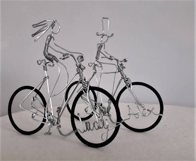 Mr and Mrs Bicycle wedding cake toppers.