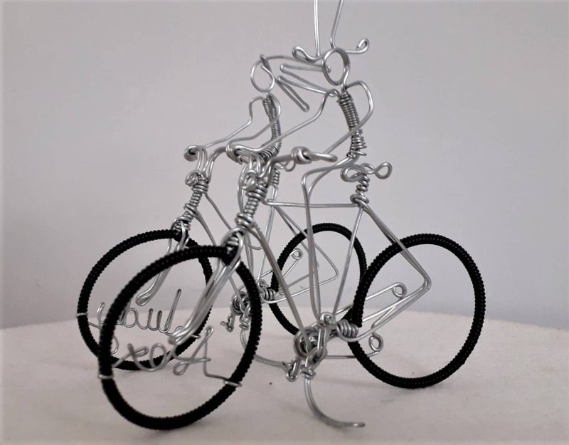 Mr and Mrs Bicycle wedding cake toppers.