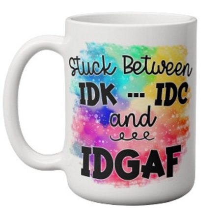 Stuck Between IDK, IDC and IDGAF Mug