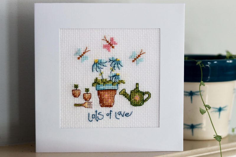 In the garden -A Cross stitch greetings card for all occasions and perfect for any loved one