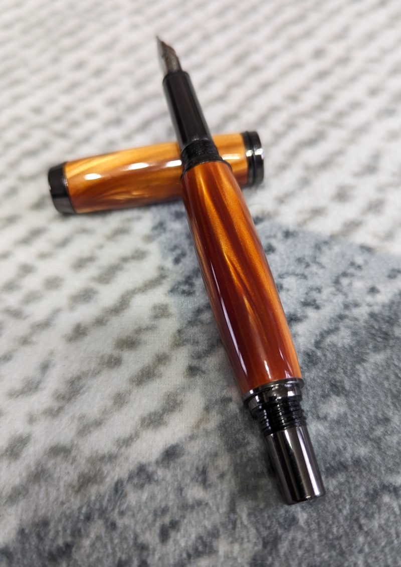 Acrylic Jr Gentleman-style fountain pen made from graduated golden brown acrylic