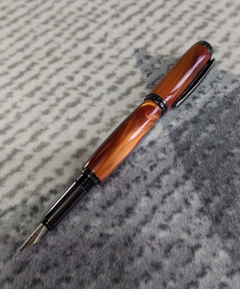 Acrylic Jr Gentleman-style fountain pen made from graduated golden brown acrylic