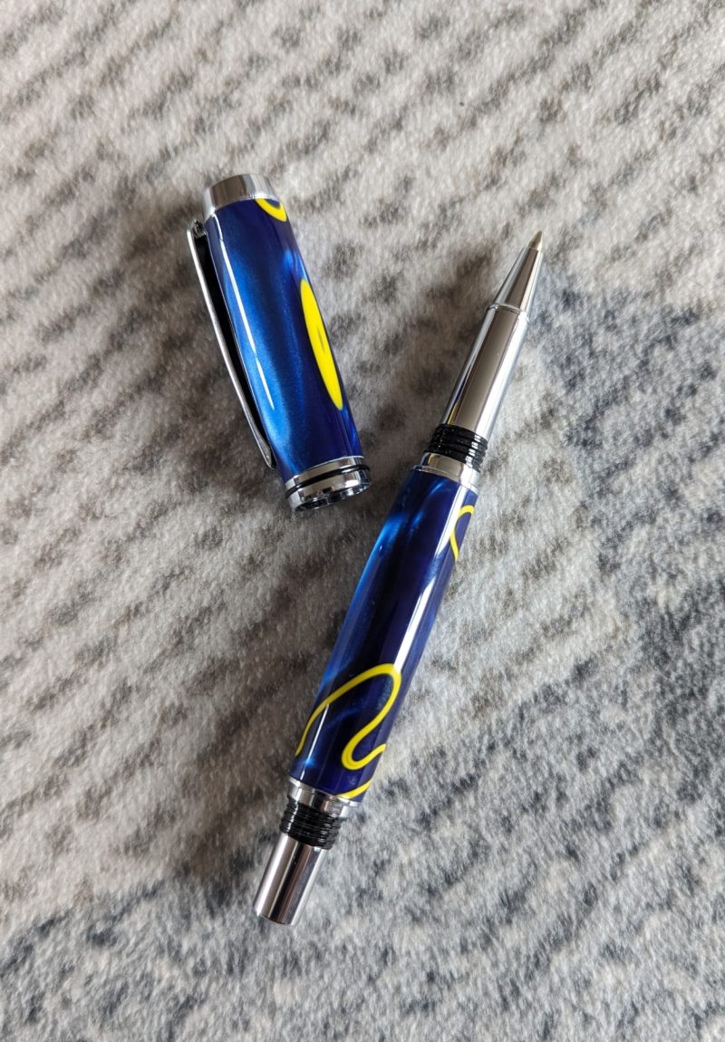 Acrylic Jr Gentleman-style Rollerball Pen Made from shimmery blue acrylic with yellow lines