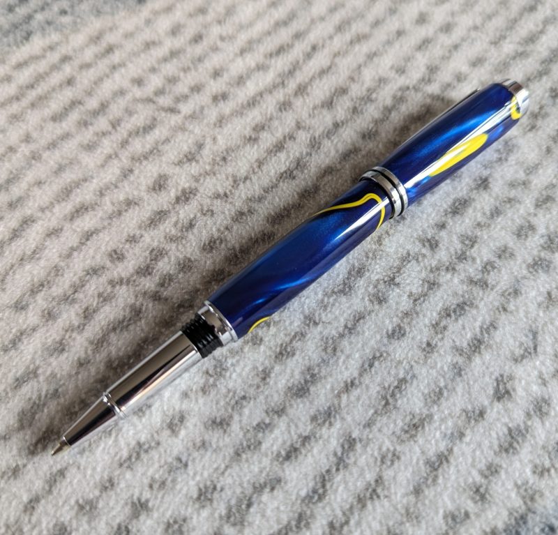 Acrylic Jr Gentleman-style Rollerball Pen Made from shimmery blue acrylic with yellow lines