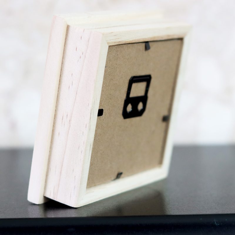 A wooden framed cross stitch a lovely little gift for yourself or a loved one.