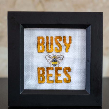 A wooden framed cross stitch a lovely little gift for yourself or a loved one.