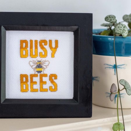 A wooden framed cross stitch a lovely little gift for yourself or a loved one.