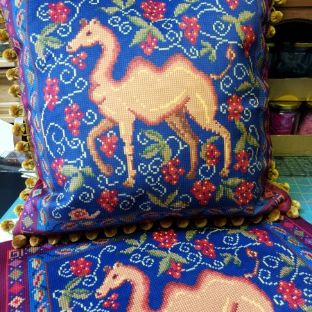 The Camel Velvet Cushion, Tapestry Style Print with Pom-pom Trim.