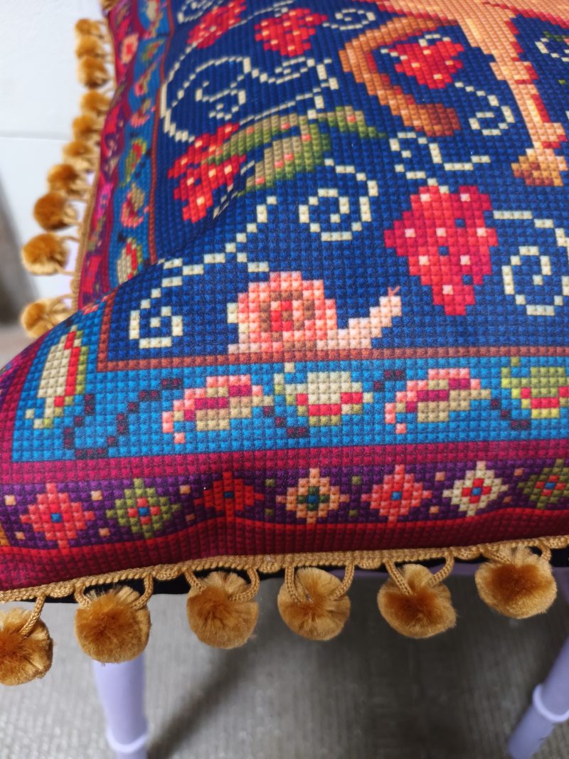 The Camel Velvet Cushion, Tapestry Style Print with Pom-pom Trim.