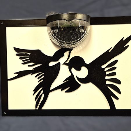 Birds solar light wall plaque.