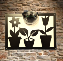 Flowers solar light wall plaque.