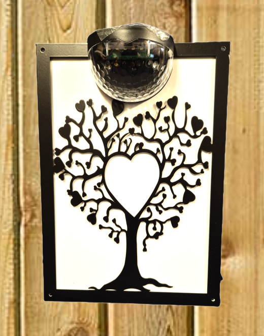 Tree of hearts solar light wall plaque.