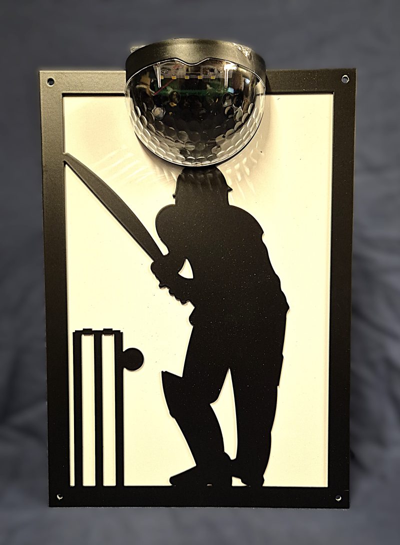 Cricket player solar light wall plaque.