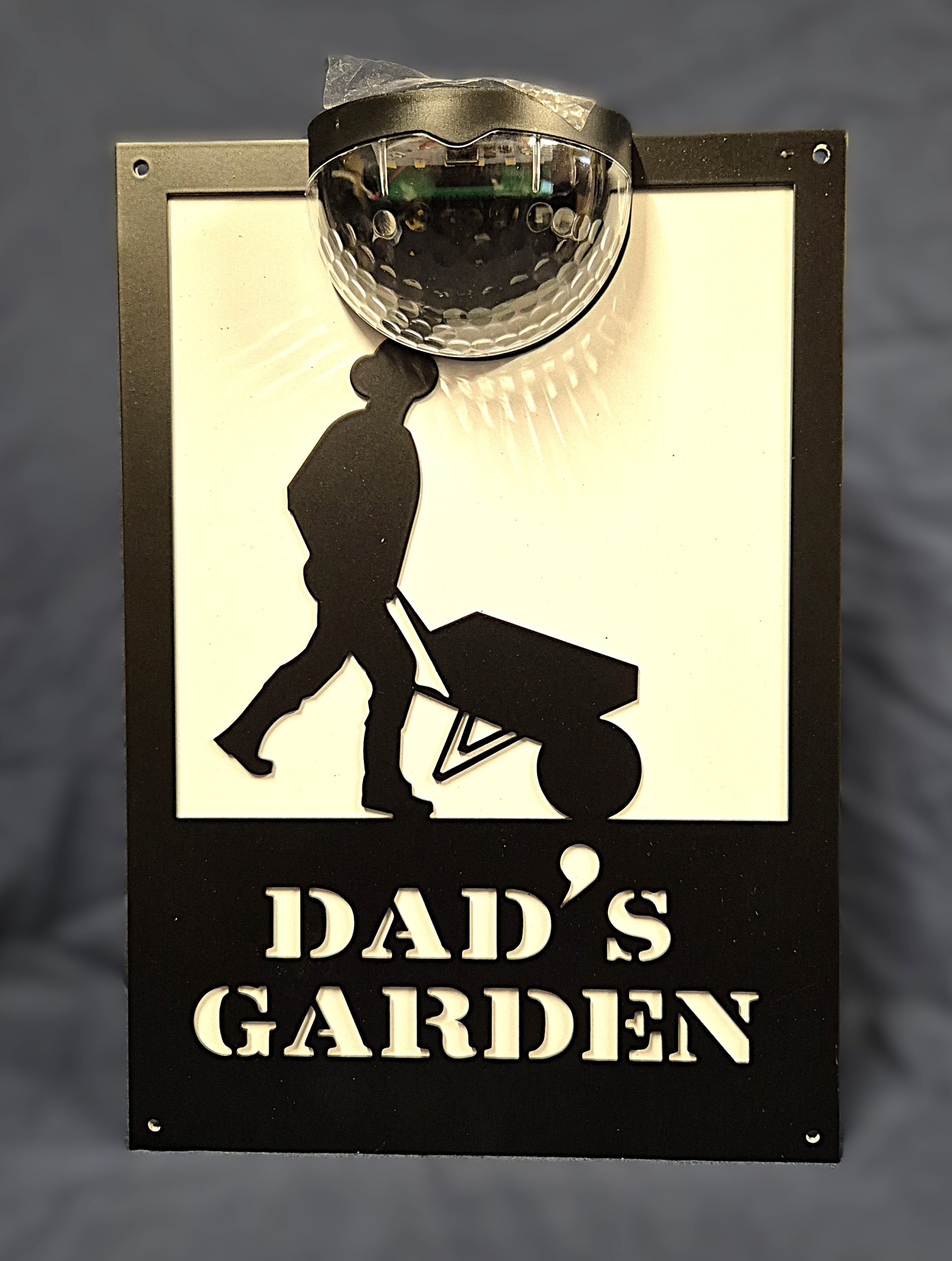 Dad's garden solar light wall plaque.