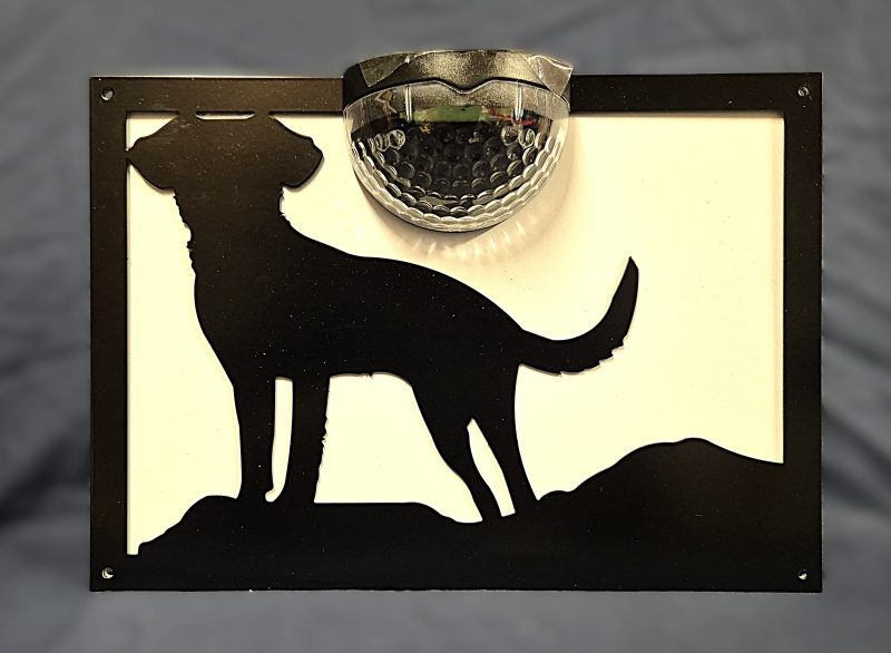 Dog solar light wall plaque.