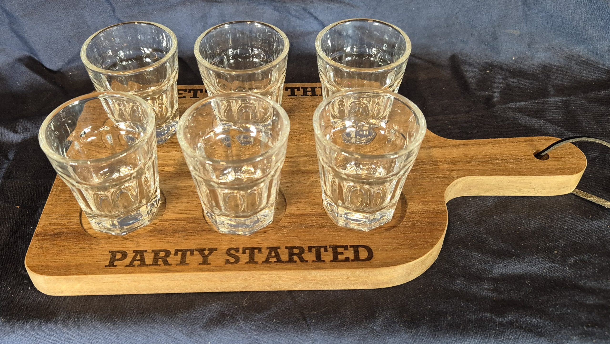 Let's get this party started wooden shot glass paddle.