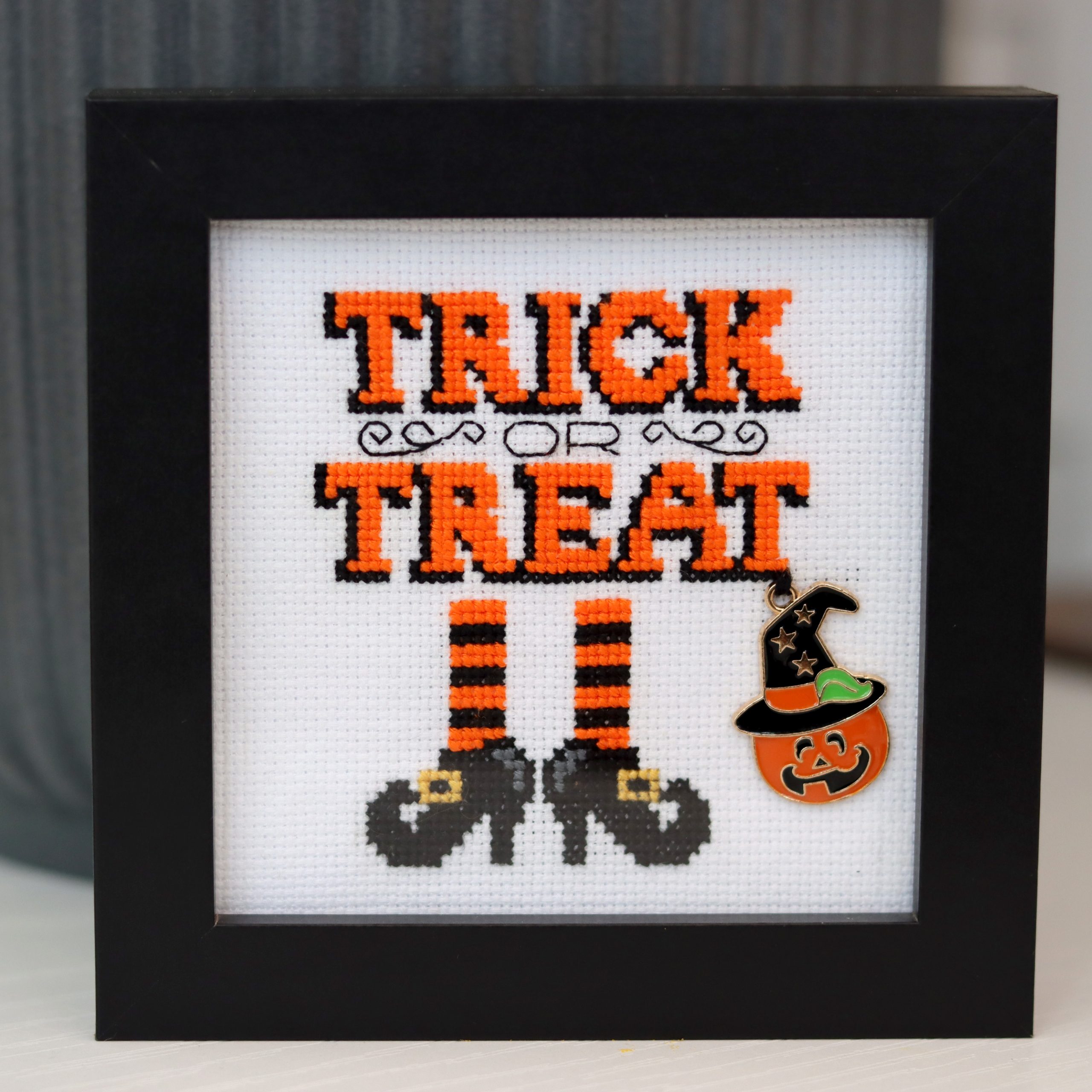 A wooden framed cross stitch - A lovely little gift for yourself or any Halloween lover.
