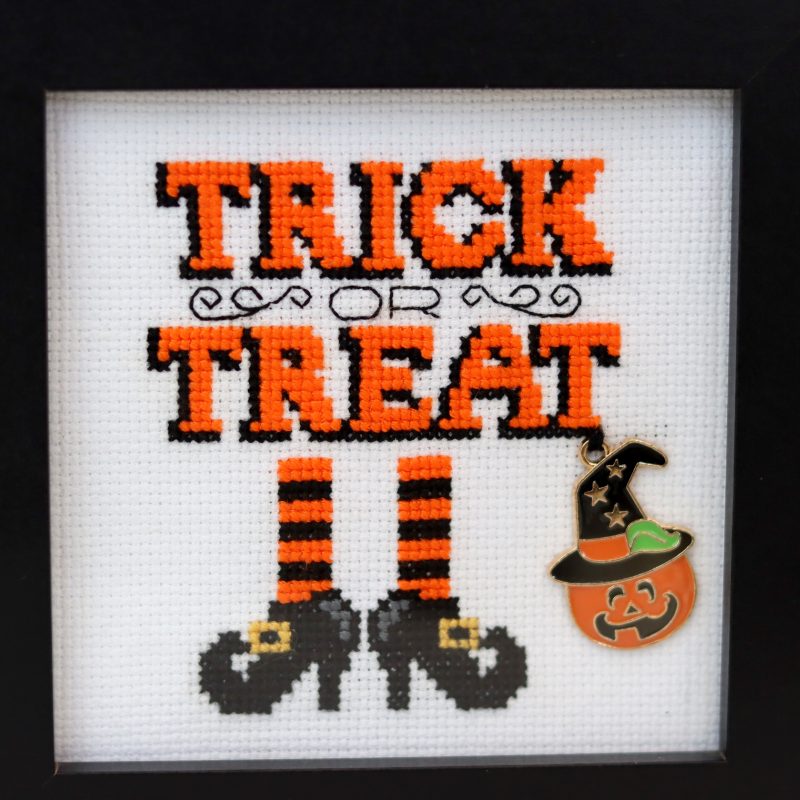 A wooden framed cross stitch - A lovely little gift for yourself or any Halloween lover.