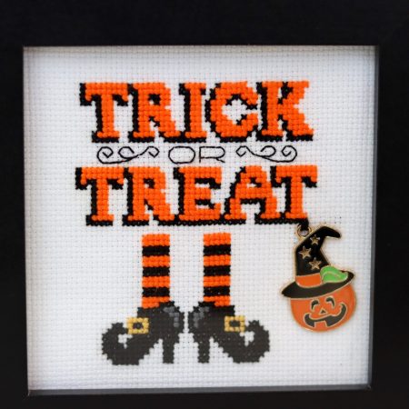 A wooden framed cross stitch - A lovely little gift for yourself or any Halloween lover.