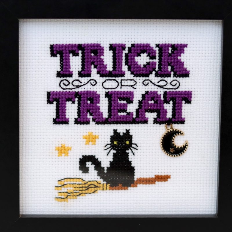 A wooden framed cross stitch - A lovely little gift for yourself or any Halloween lover.