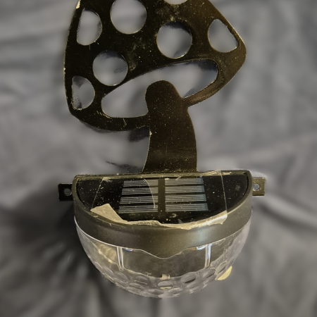 Toadstool fence post solar light.