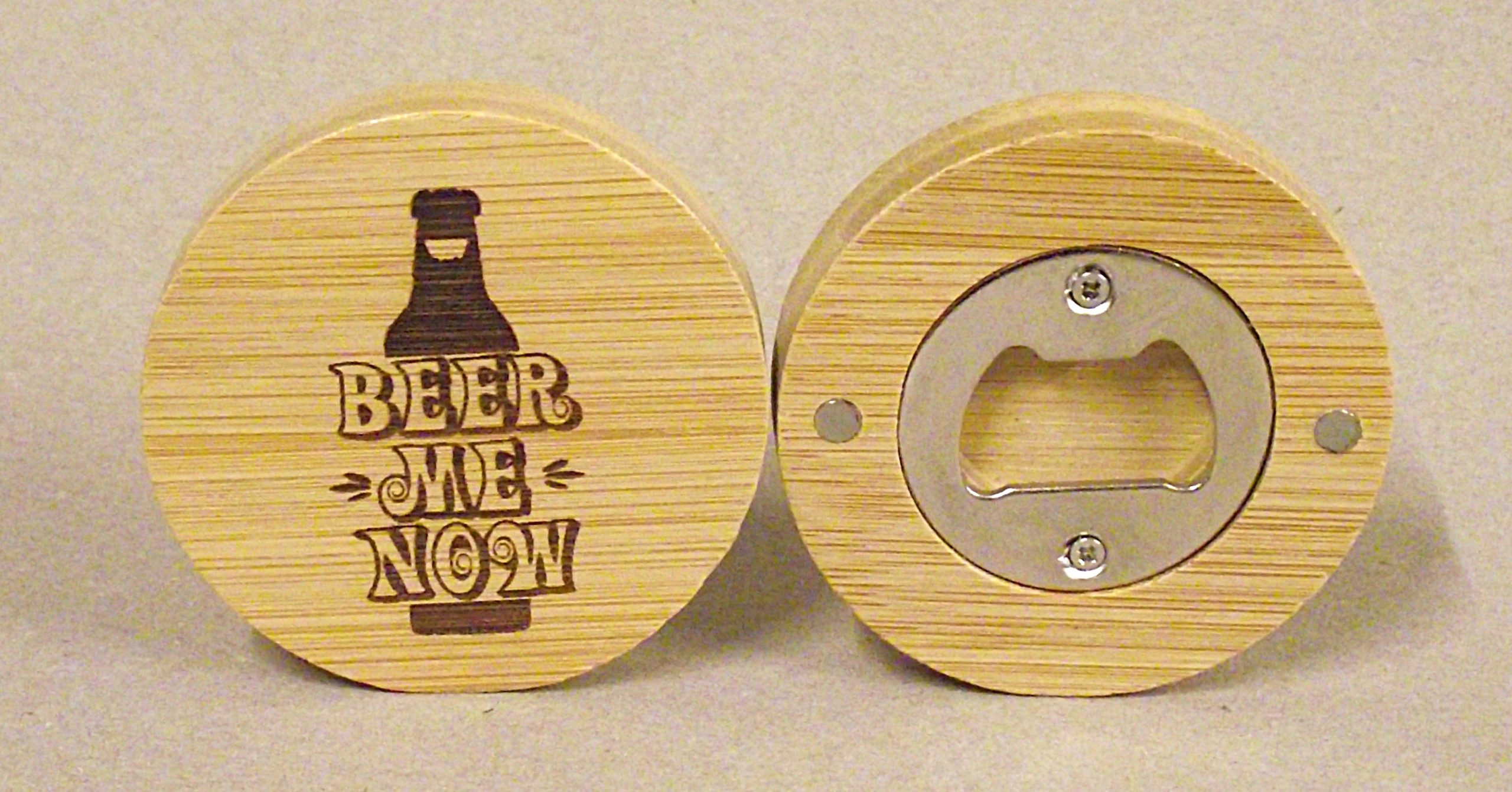 Circular magnetic bottle opener.