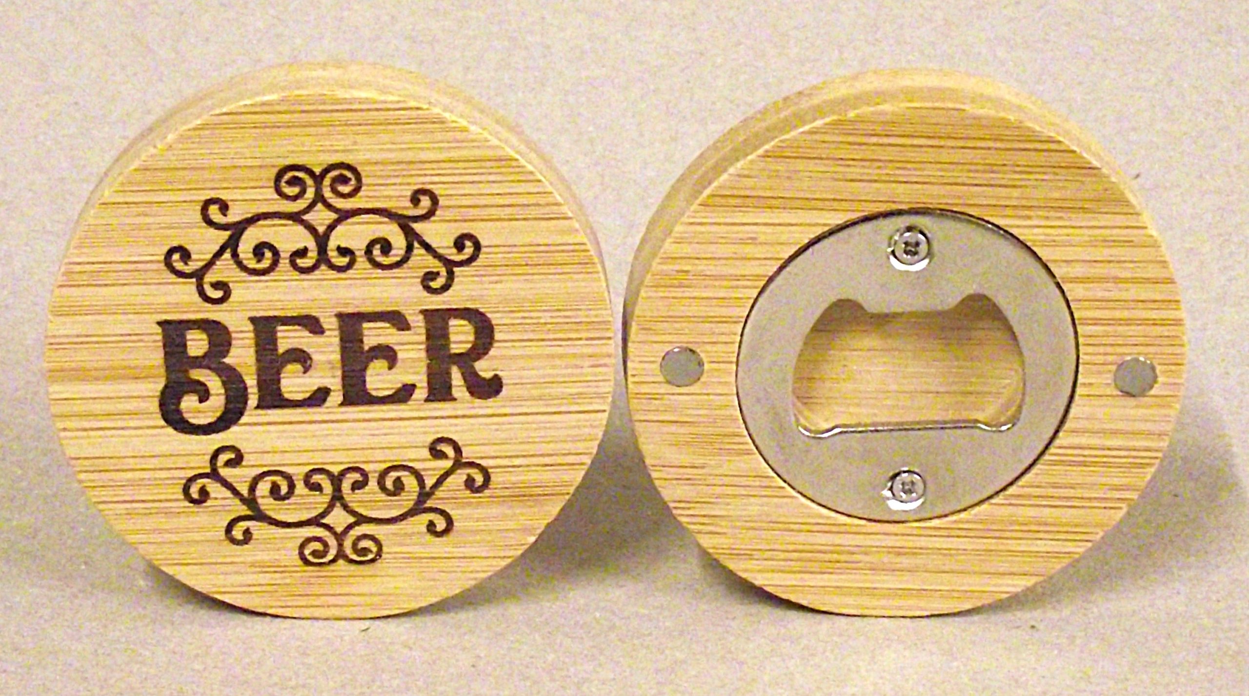 Circular magnetic bottle opener.