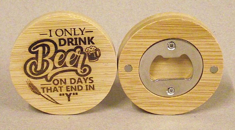 Circular magnetic bottle opener.