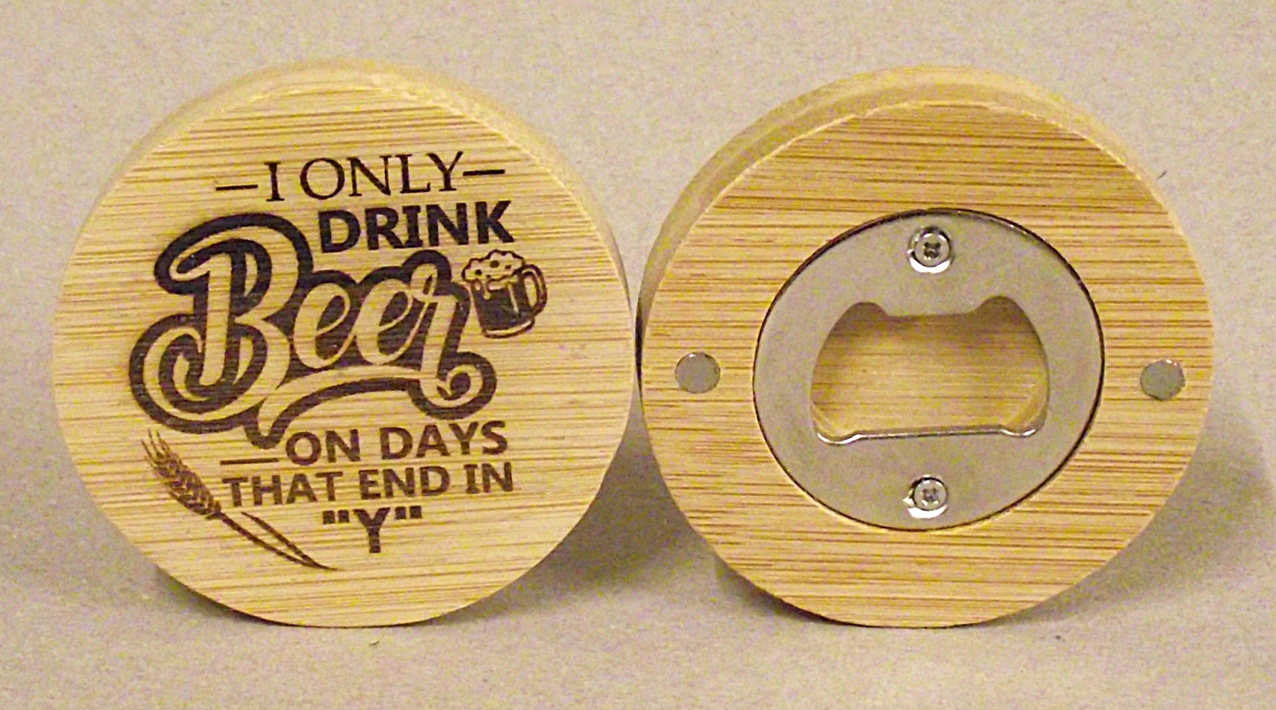 Circular magnetic bottle opener.