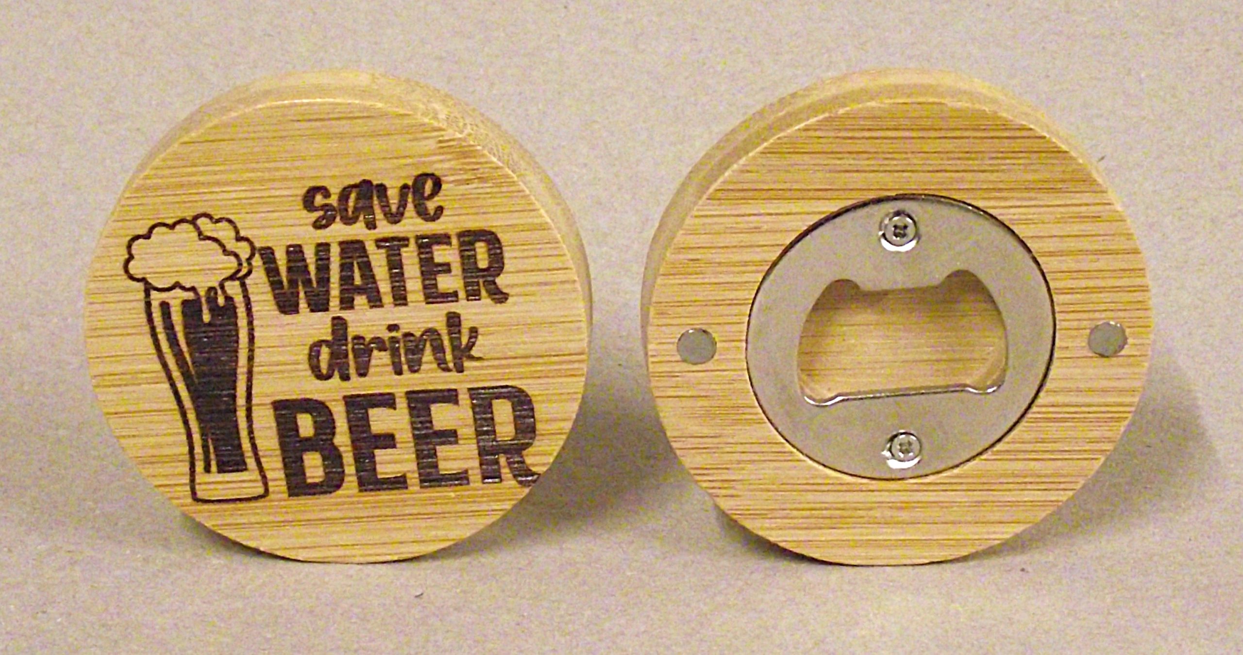 Circular magnetic bottle opener.