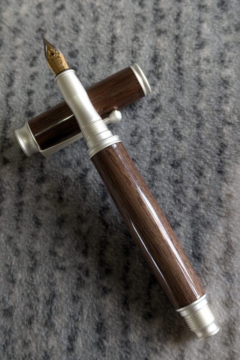 Hand turned Omega style wooden fountain pen made in walnut