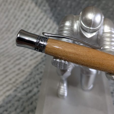Hand turned wooden Epsilon style pen made from Elm wood with chrome fittings and a high gloss finish