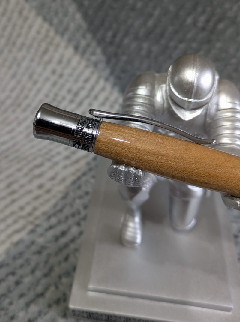 Hand turned wooden Epsilon style pen made from Elm wood with chrome fittings and a high gloss finish