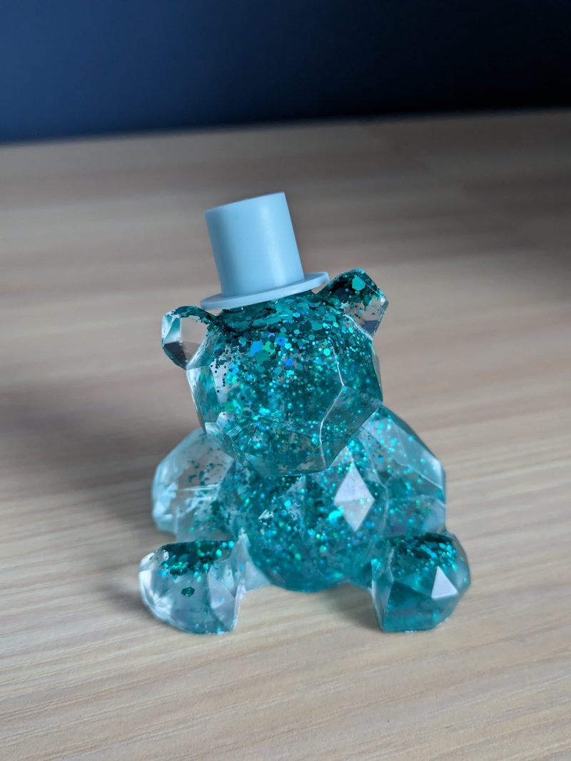 Resin bears come in various colours with various accessories