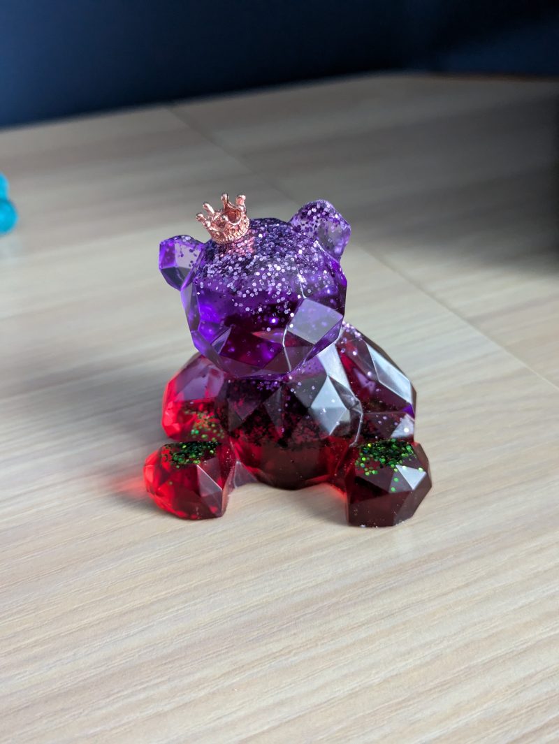Resin bears come in various colours with various accessories