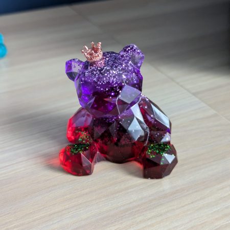 Resin bears come in various colours with various accessories