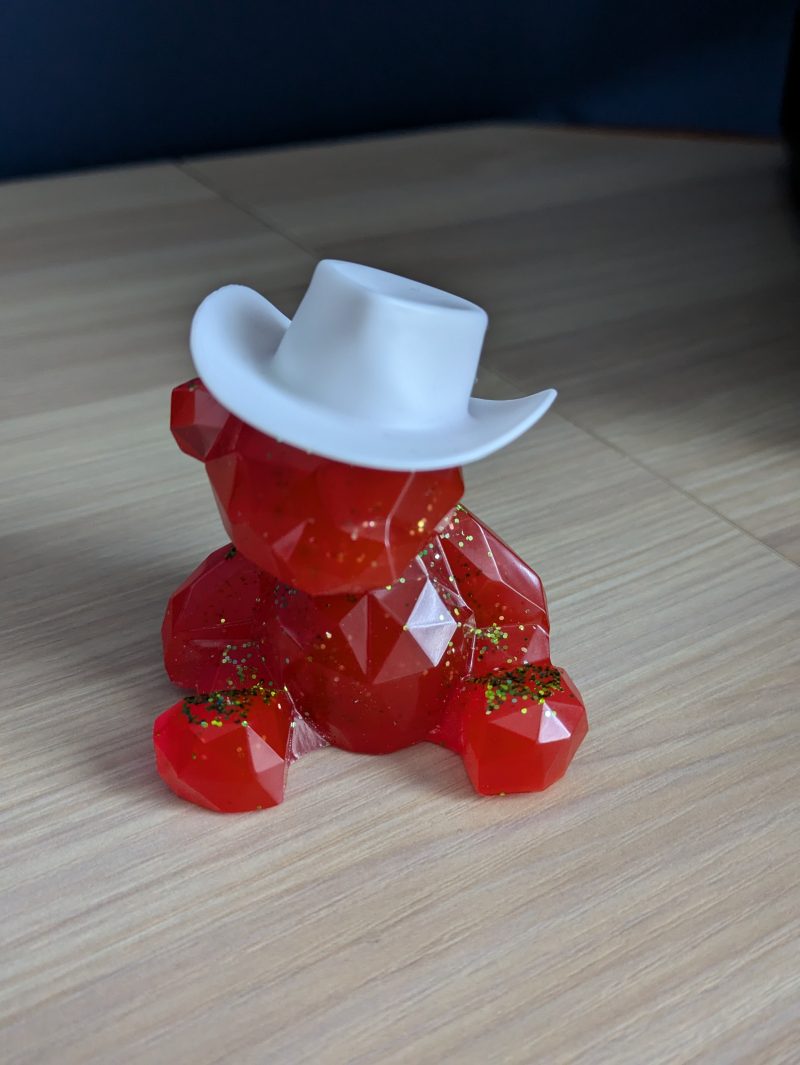 Resin bears come in various colours with various accessories