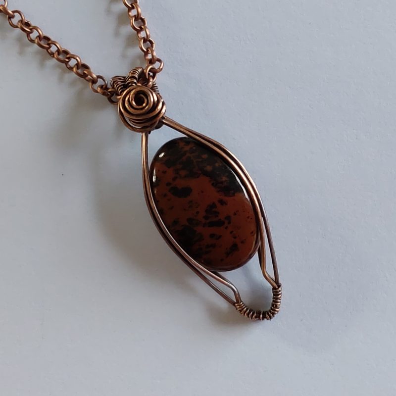 Wire wrapped Mahogany Obsidian pendant in antiqued copper. Length 4.5 cm with an 18 inch Rolo link chain. Free Tracked postage in UK