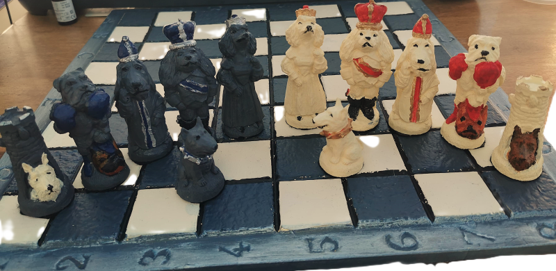Unique Handmade and Hand Painted Dogs themed Chess set with Matching Stonecast rustic board
