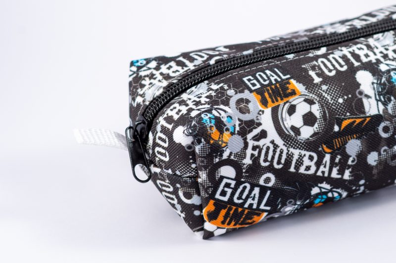 Football themed pencil case, fully lined with webbing zipper tabs.