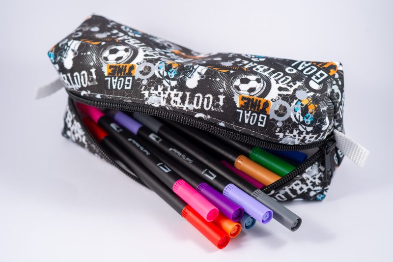 Football themed pencil case, fully lined with webbing zipper tabs.