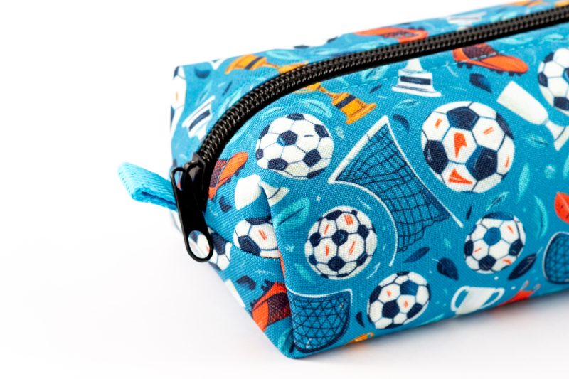 Football themed pencil case, fully lined with webbing zipper tabs.