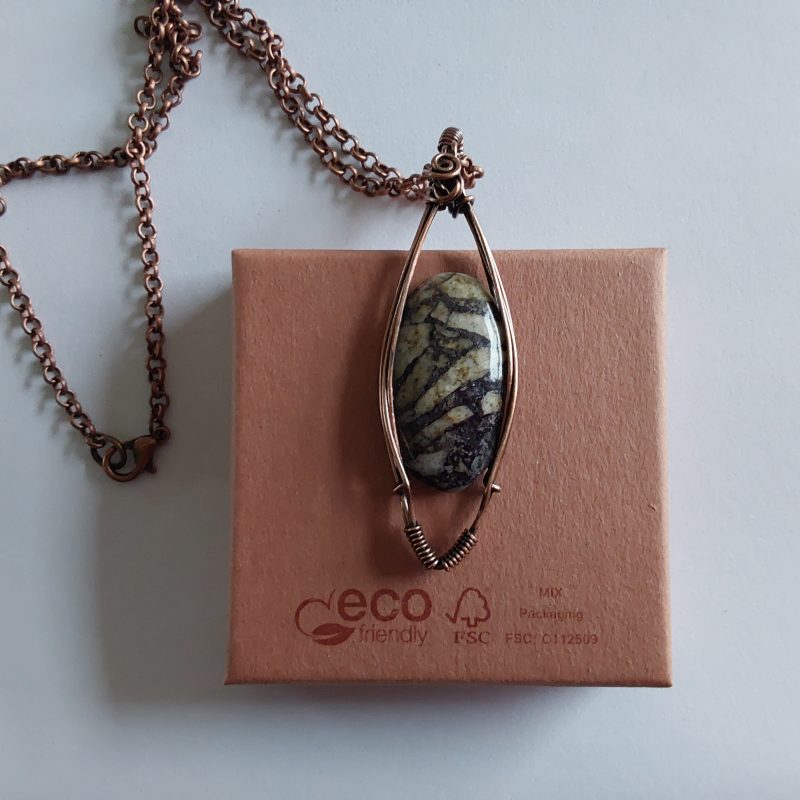 Wire wrapped Flourite in Feldspar cabochon pendant.